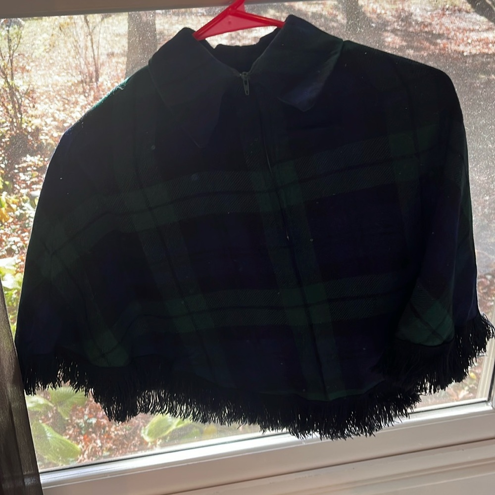 Children’s cape plaid green and blue.  Like new condition.  Fiona McDonald.